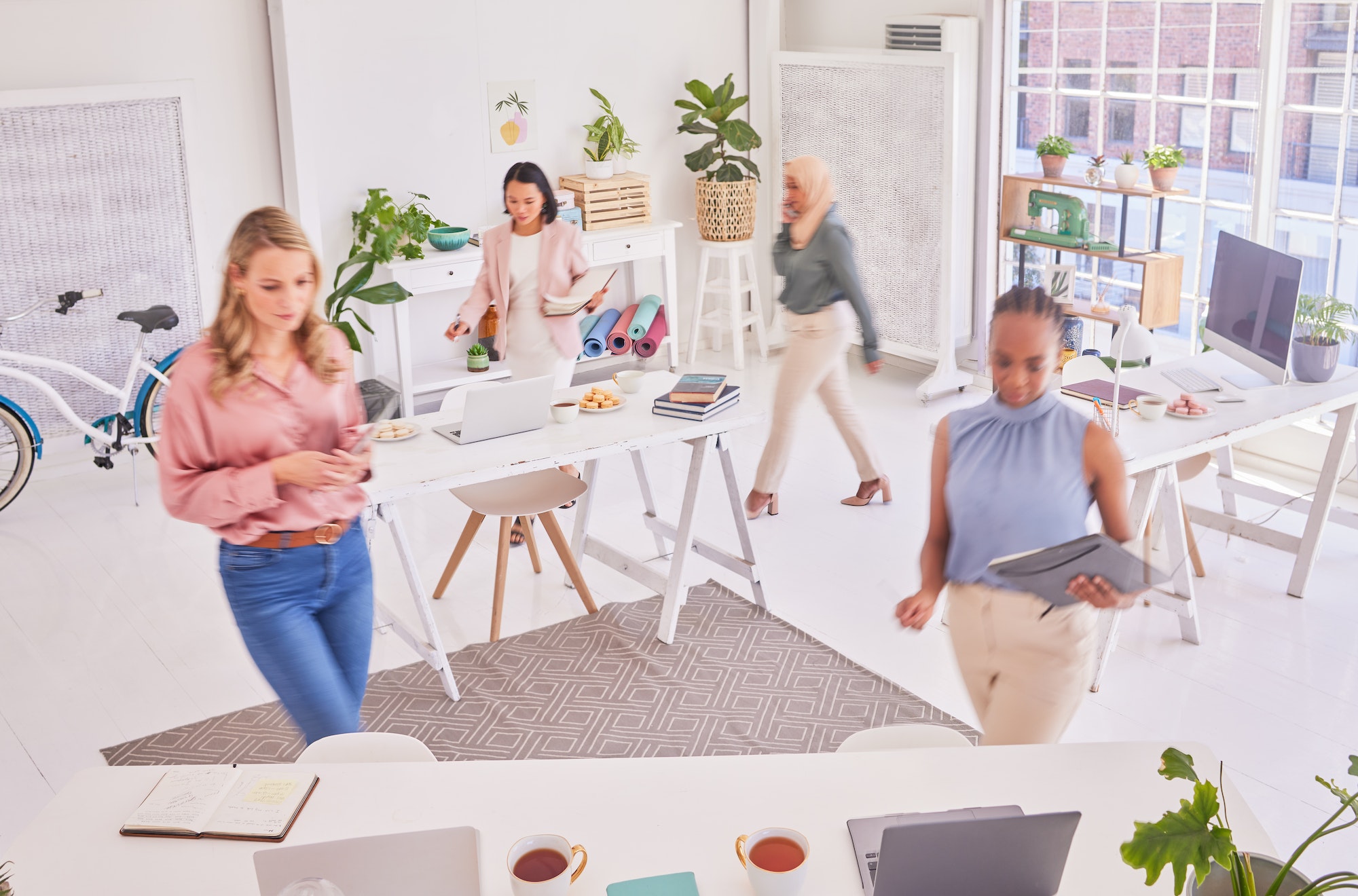 Diversity. office, busy and women walking, moving fast and planning advertising campaign or global